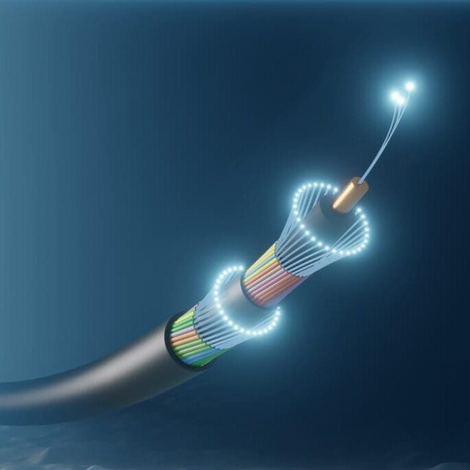 Submarine underwater communication fibre optic cable on deep sea bed.